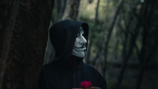Masked figure flower forest sinister - their hand in free wallpaper