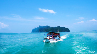 Boat mountains islands blue sky - white cloud free wallpaper for desktop