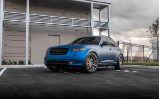 Blue car parking lot building - a balcony free wallpaper