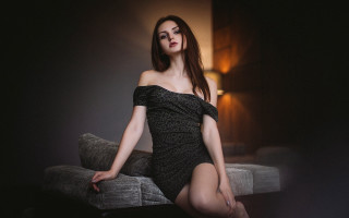 Elegant woman black dress couch - a lamp free wallpaper for desktop