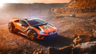 Sports car rocky road desert - a sports car free wallpaper