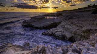 Rocky cliff water sunset clouds - constantine andreou free wallpaper for desktop