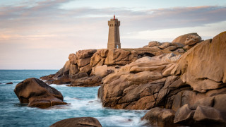Lighthouse rocky shore cinematic mountains - a rocky shore free wallpaper for desktop