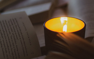Candle lit dark candleholder books - a candle free wallpaper
