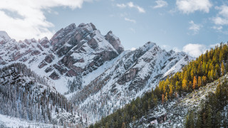Snowy mountain cityscape cloudy sky - covered mountain free wallpaper