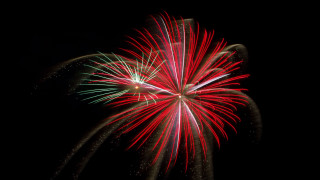 Fireworks night sky city lights 3 - green free wallpaper