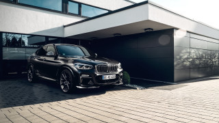 Black car building garage tree - a tree in front free wallpaper