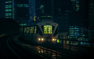 Train city night cyberpunk neon - a train traveling free wallpaper