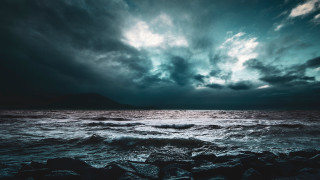 Dark ocean cloudy sky mountain - stormy weather free wallpaper