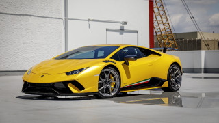 Yellow sports car building crane - a crane in the background free wallpaper