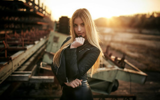 Woman leather outfit train sunset - a leather outfit free wallpaper