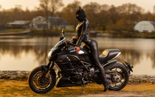 Woman motorcycle lake cat suit - a woman in a cat suit free wallpaper