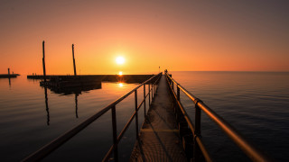 Sunset pier person anamorphic flare - a pier free wallpaper