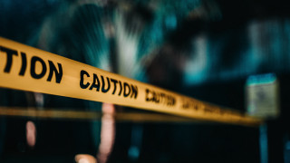 Caution sign blurry building tree - anamorphic len free wallpaper