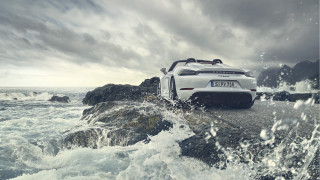 White sports car rocky shore - a white sports car free wallpaper