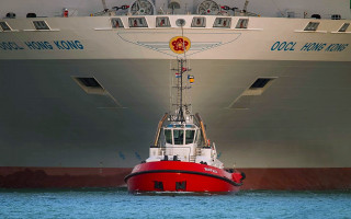 Large boat near ship flag - a tilt shift photo free wallpaper