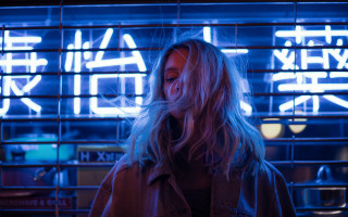 Neon portrait woman blue light - a blue light behind her free wallpaper