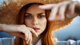 Woman hat pointing blurry portrait - a straw hat free wallpaper