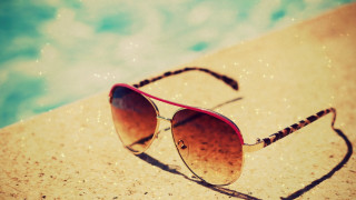 Sunglasses sand pool blue sky - a pair of sunglasses free wallpaper