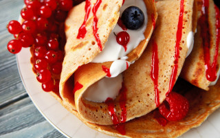 Pancakes berries cream syrup closeup - top of them free wallpaper