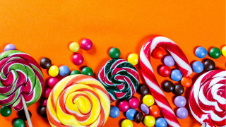 Candy lollipops orange background maximalism - a orange background free wallpaper