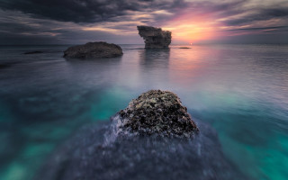 Ocean rock sunset mystical colors - a rock in the middle of the ocean free wallpaper
