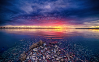 Sunset water rocks cloudy sky - mystical free wallpaper for desktop