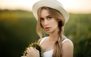 Woman hat sunflower field blurry - yellow flower free wallpaper