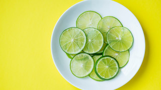 Sliced limes yellow background white - the middle free wallpaper