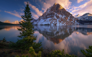Mountain lake forest sunset sky - a lake in front free wallpaper
