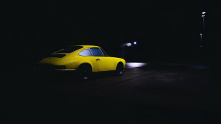 Yellow car night street light - a street light in the background free wallpaper