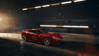 Red sports car dark garage 4 - the side of it free wallpaper