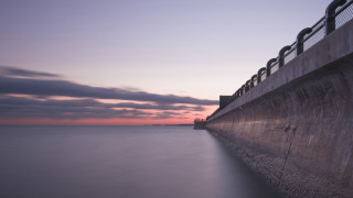 Ocean sunset mountain clouds tilt - a sunset in the background free wallpaper