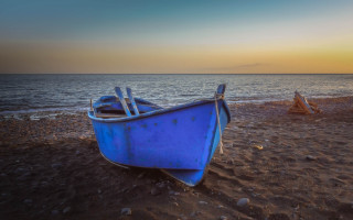 Blue boat beach sunset ocean - sandy free wallpaper