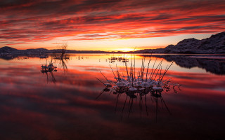 Sunset lake boats mountains clouds - the water and a mountain in the background free wallpaper