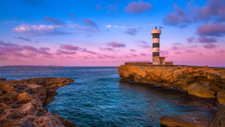 Lighthouse cliff ocean sunset pink - a lighthouse free wallpaper