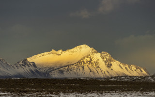 Snow mountain cloudy sky dramatic - dramatic light free wallpaper