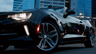 Black car tall building city - its light free wallpaper