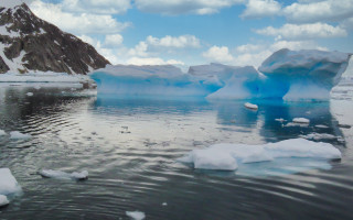 Icebergs mountains clouds sky water - the water near a mountain range free wallpaper