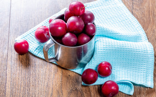 Metal cup cherries wooden table - cherry free wallpaper