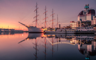 Harbor sunset boat city building - reflection free wallpaper