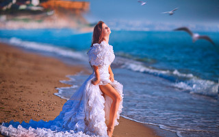 Beach woman white dress seagulls - overhead free wallpaper