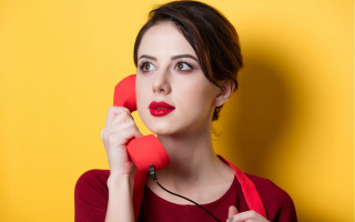 Surprised woman red phone portrait - elke vogelsang free wallpaper