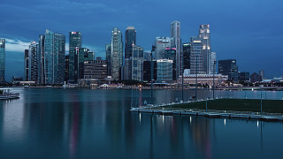 City skyline night water boat - a boat in the foreground free wallpaper