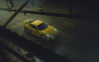 Yellow sports car night street - a yellow sports car free wallpaper