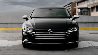 Black car parking lot futurism - a yellow stripe free wallpaper