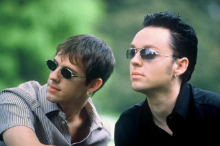 Two men sunglasses looking distance - the distance free wallpaper