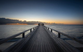 Pier ocean sunset clouds precisionism - a dark cloud in the sky free wallpaper