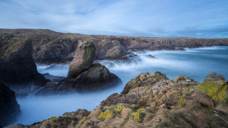 Rocky cliff lake mountains misty - mist free wallpaper