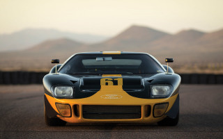 Yellow black sports car mountains - f 8 aperture free wallpaper
